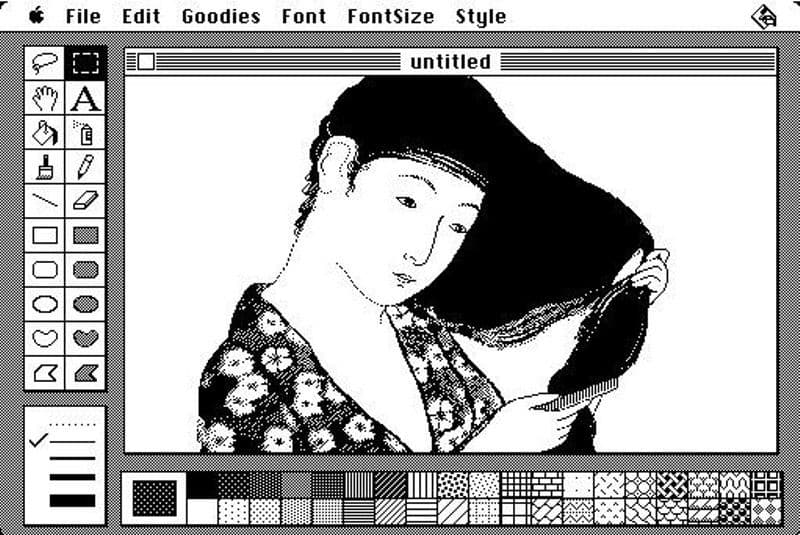 Pixel art of a woman in traditional attire drawn on an early computer program called MacPaint.