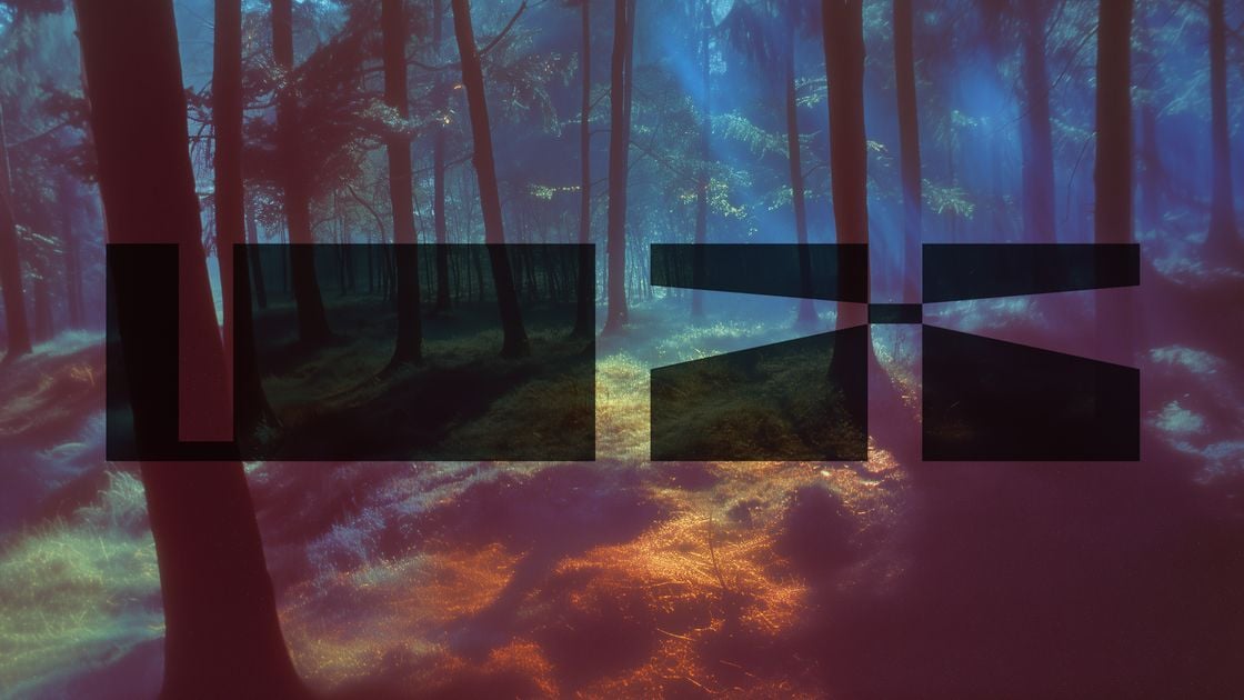 Surreal, digitally manipulated forest scene with strong color overlays in red, blue, and purple hues. A dark, blocky abstract logo is superimposed in the foreground.